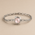 Celestial Star-Shaped Dress Watch | Crystal Rhinestone Timepiece with pink face and star-shaped bracelet.