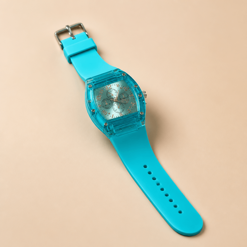 Translucent Tonneau Sports Watch | Unisex Silicone Chronograph-Style with turquoise strap on beige background.
