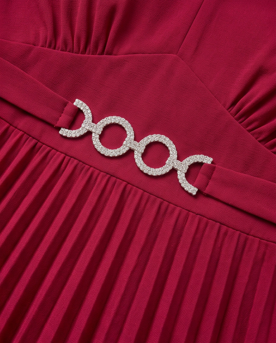 Embellished Buckle Trim Pleated Flutter-Sleeve Midi Dress from the plus- featuring a sparkling rhinestone belt detail.