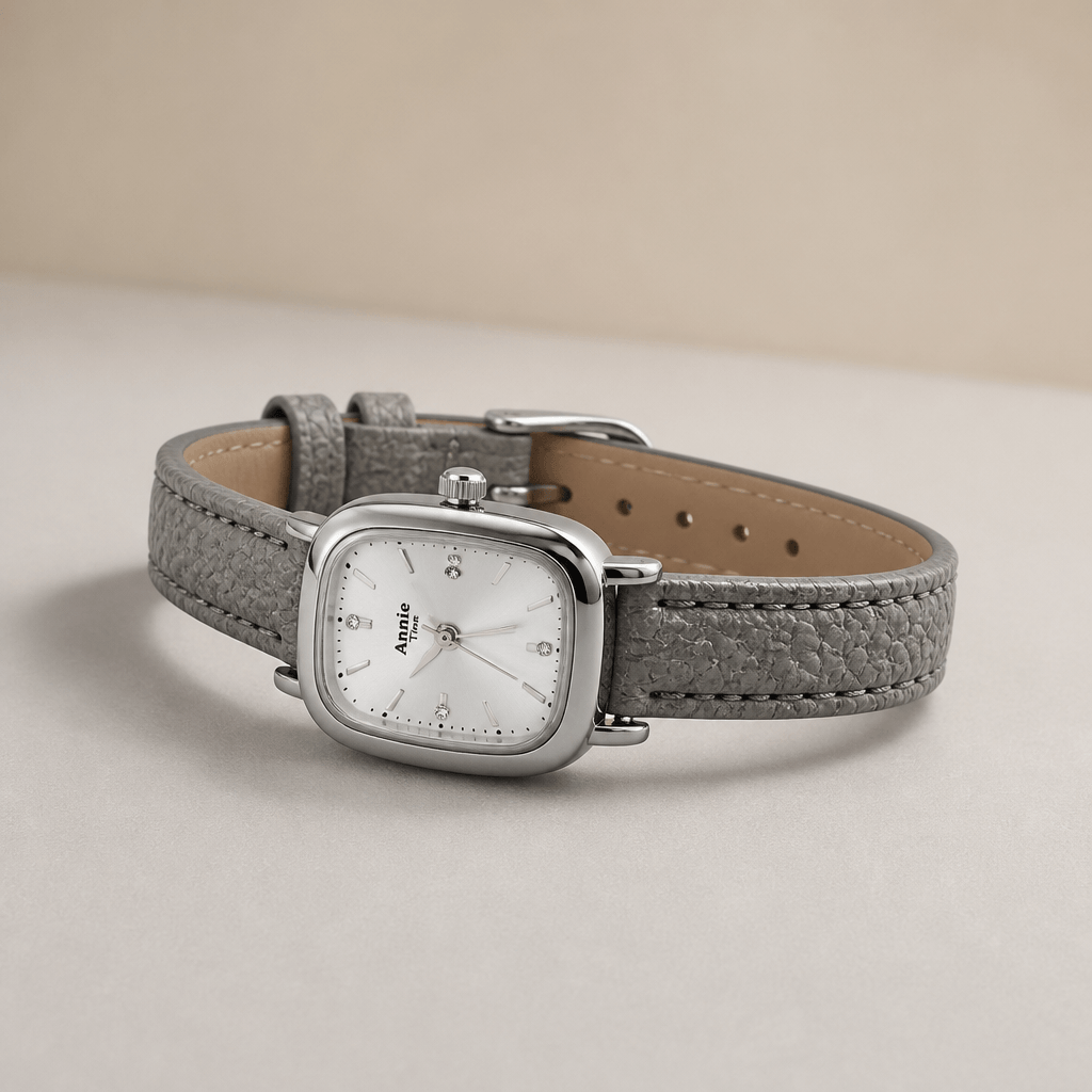 Vintage Cushion-Case Women's Watch | Gold-Plated & Emerald Leather Strap on a neutral background.