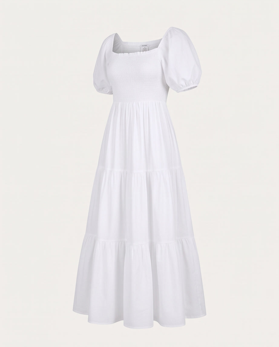Square-Neck Puff-Sleeve Smocked Maxi Dress in white showcasing a stylish design with puff sleeves and a flowy skirt.