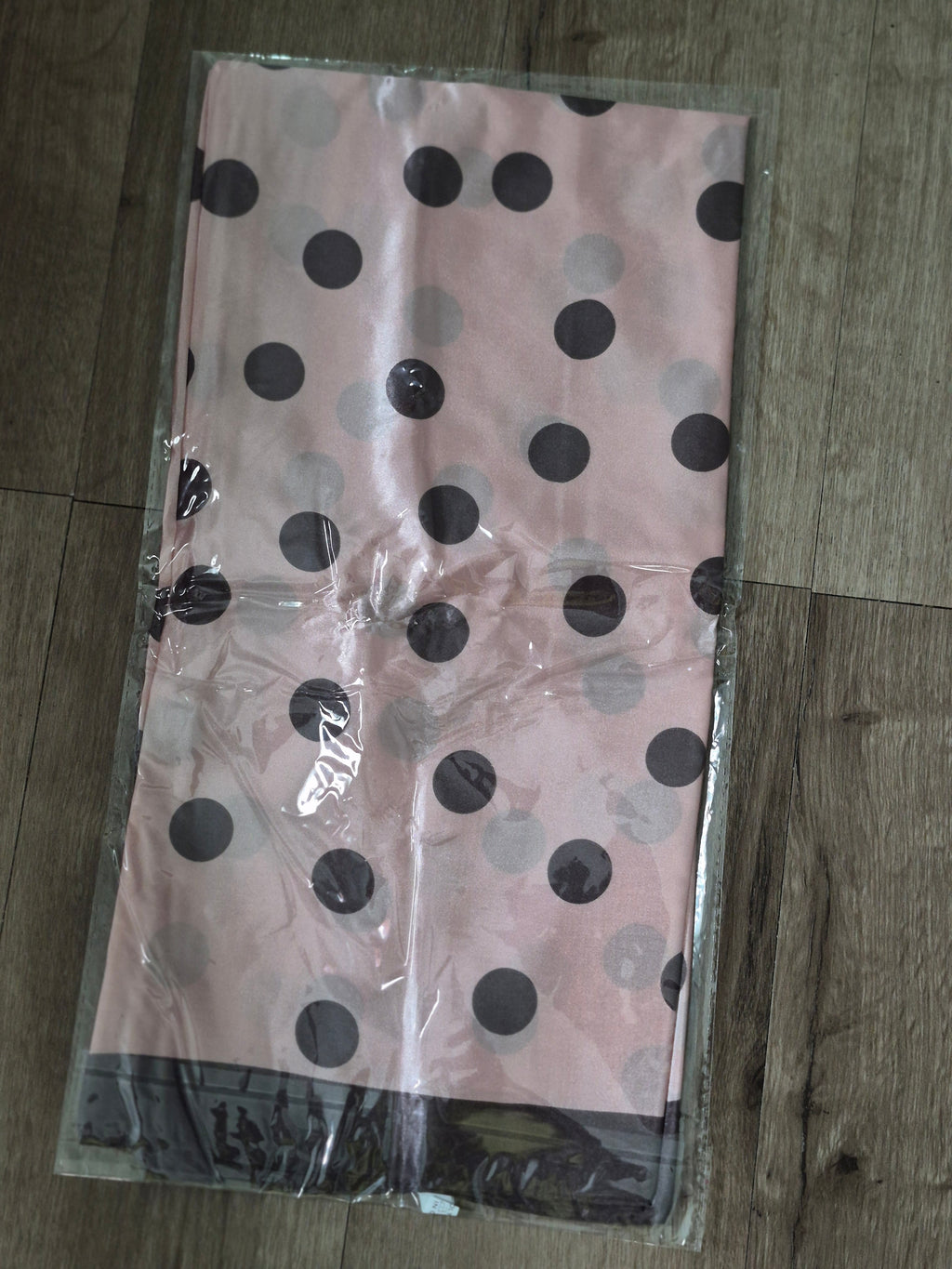 Polka Dot Silk-Feeling Square hair scarf displayed in packaging with pink background and dark polka dots.