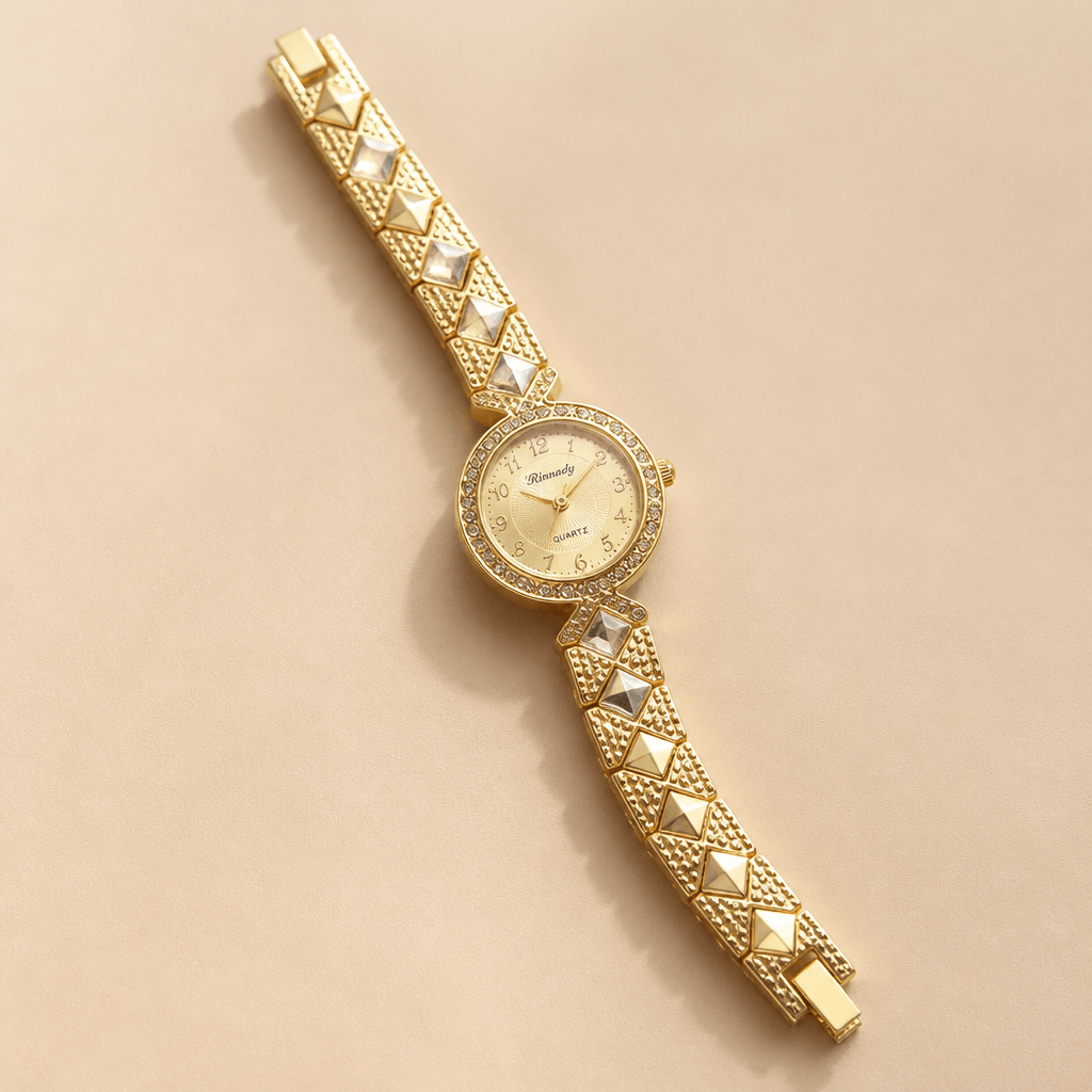 Gold-Tone Rhinestone Bracelet Watch | Luxury Jewelry Watch for Women on a light background.