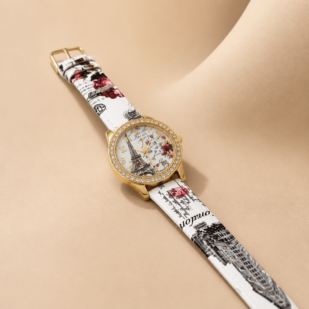 Silver-Tone Rhinestone Bracelet Watch | Elegant Jewelry Watch for Women with floral design and Eiffel Tower detail.