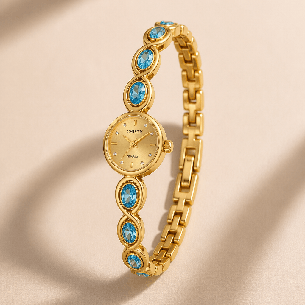 Faceted Crystal Cocktail Watch | Jewelry Link Wristwatch with gold bracelet and blue crystals on a beige background.